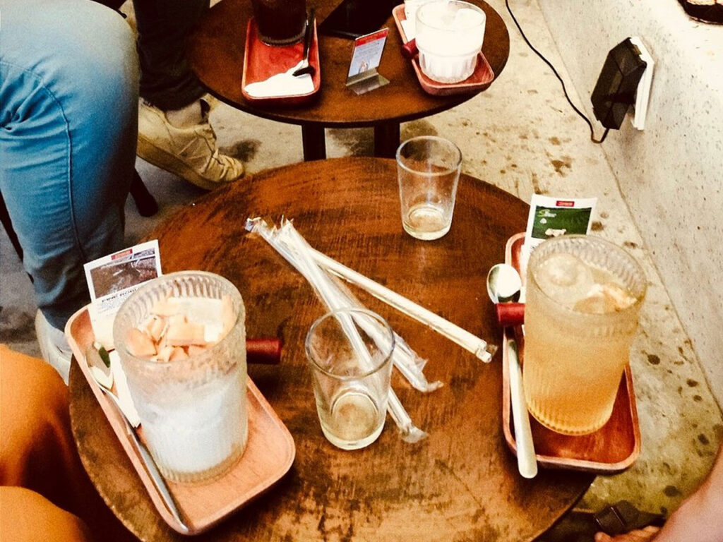 Why is coconut coffee popular with travelers